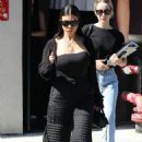Kourtney Kardashian – In all black at the BooHoo store in West Hollywood