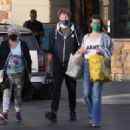 Milla Jovovich – Shopping with her husband in Los Feliz - 454 x 324
