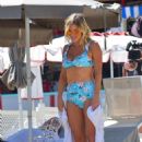 Sophie Monk in Blue Bikini on a beach in Portofino