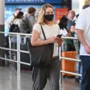 Jennifer Lawrence – With Cooke Maroney arrive at JFK