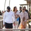 Eva Longoria – Was walking and playing on the beach in Marbella