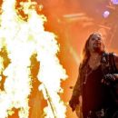 Recording artist Vince Neil of the band Motley Crue perform onstage during the 2014 iHeartRadio Music Festival at the MGM Grand Garden Arena on September 19, 2014 in Las Vegas, Nevada