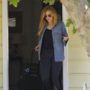 Christine Ouzounian is spotted leaving her home in Santa Monica, California and heading to a meeting in Century City on August 14, 2015 - 454 x 595