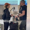 Renee Zellweger – With Ant Anstead catch a flight out of Los Angeles - 454 x 643