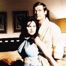 Roger Moore and Madeline Smith