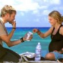 Emilie De Ravin is Claire and Dominic Monaghan is Charlie on Lost. - 454 x 254