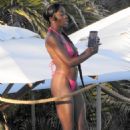 Chelsea Lazkani – In a pink bikini on set for Selling Sunset in Los Cabos - 454 x 651
