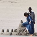 Olivia Colman – Filming on Camber Sands beach - 454 x 315