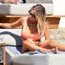 Laura Anderson – Seen in a coral swimsuit in Mykonos - 454 x 319