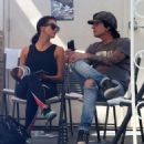 Rocker Tommy Lee and his fiance Sofia Toufa stop by a car wash in Calabasas, California on May 12, 2016. Tommy sat by himself and sent some text messages before returning to Sofia's side - 454 x 507