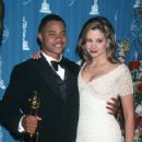 Cuba Gooding Jr and Mira Sorvino  attendsThe 69th Annual Academy Awards - Press Room (1997) - 421 x 612