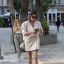 Shay Mitchell – In a tan blazer while shopping with a friend in Miami