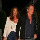 Cindy Crawford looks ultra-chic in a satin top and blazer as she heads out for a romantic dinner with husband Rande Gerber in Santa Monica - 454 x 550