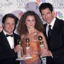Michael J.Fox, Keri Russell and Dylan McDermott attends The 56th Annual Golden Globe Awards - Press Room (1999) - 454 x 306