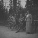 Grand Duchess Anastasia Nikolaevna, Tsaritsa Alexandra Feodorovna, Tsar Nicholas II, Grand Duchess Olga Nikolaevna and Grand Duchess Maria Nikolaevna at the Alexander Park in Tsarskoe Selo, 16th - 24th April 1916. - 454 x 447