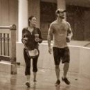 CM Punk and Lita walking in the rain - 454 x 255
