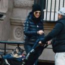 Julianna Margulies – Enjoys a stroll with her pooch in New York - 454 x 685