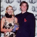 Jim Carrey and Lauren Holly attends The 1995 MTV Movie Awards - 434 x 612