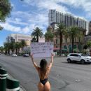 Liziane Gutierrez – In swimsuit in call for Biden to ship vaccines to Brazil in Miami - 454 x 605