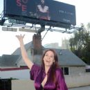 Maitland Ward – Posing at billboard for ‘MUSE’ film on Highland Ave in Hollywood