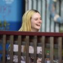 Elle Fanning – Is having a great time with her friends in Los Angeles - 454 x 409