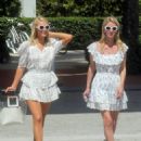Paris and Nicky Hilton – Posing for pictures at W Hotel in Miami Beach