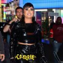 Demi Lovato – Taking photos on her digital Time Square billboard in New York
