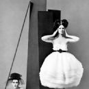 Dovima and Betsy Pickering in dresses by Lanvin-Castillo, photographed by Richard Avedon. 1958