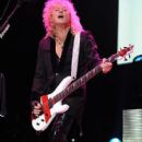 Rick Savage - During Def Leppard’s performance at the Cruzan Amphitheatre in West Palm Beach, Florida on June 15, 2011 - 408 x 612