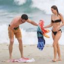 Gabriella Brooks in Black Bikini and Liam Hemsworth on the beach in Byron Bay - 454 x 346