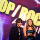Richie Sambora and Colbie Caillat onstage during the 2008 American Music Awards on November 23, 2008 in Los Angeles, CA - 454 x 303
