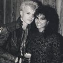 Billy Idol and Vanity backstage in his dressing room after a concert in Los Angeles, 1987 - 454 x 560