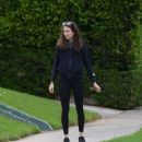 Troian Bellisario – Out for a walk with her dog in Los Angeles - 454 x 546
