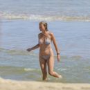 Gwyneth Paltrow – Bikini candids at a beach in The Hamptons