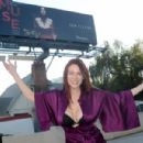 Maitland Ward – Posing at billboard for ‘MUSE’ film on Highland Ave in Hollywood