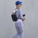 Paris Hilton – With her dog in Malibu