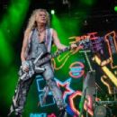 Rick Savage - During Def Leppard’s performance at the Tons of Rock Festival in Oslo, Norway on June 29th, 2019 - 454 x 303