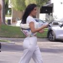 Kim Kardashian – Leaves office with glam squad in Los Angeles