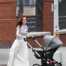 Rose Leslie – Takes her newborn for a stroll in the city in New York