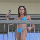 Luciana Gimenez – In a blue bikini on the balcony of her hotel in Rio de Janeiro - 454 x 636