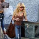 Jessica Simpson – In skintight jeans and tank-top seen in Los Angeles - 454 x 641