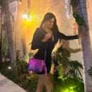 Claudia Romani – Dazzles in a low-cut black dress at Casadonna in Miami - 454 x 643