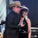 Jason Aldean and Kelly Clarkson At The 54th Annual Grammy Awards - 434 x 594