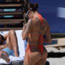 Malu Trevejo – In an orange bikini in Miami Beach - 454 x 681