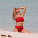 Grace Levy in Red Bikini on the beach in Tulum - 454 x 402