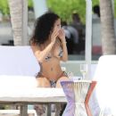 Draya Michele – In bikini on the beach in Cancun - 454 x 368