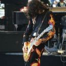 Jimmy Page performing at the Day on the Green at Oakland–Alameda County Coliseum in Oakland on July 23, 1977 - 438 x 750