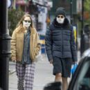 Suki Waterhouse and Robert Pattinson – Wearing matching face masks in London