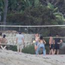 Camila Morrone and Leonardo DiCaprio play volleyball on the beach in Malibu
