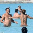 Retired footballer Ronaldo uses a selfie stick to take loved up holiday snaps in the sea with beach babe fiancé Paula Morais - 454 x 304